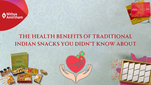 Assorted traditional Indian snacks including murukku, laddoos, and banana chips beautifully arranged on a wooden platter.